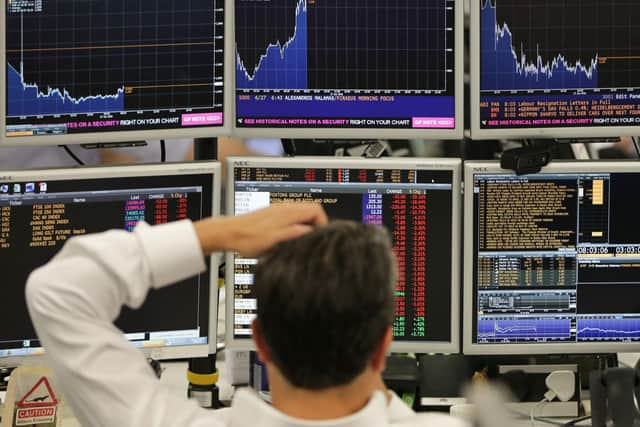 Stock markets around the world fell on fears that the new Covid strain could hamper economic recovery. Picture: Daniel Leal-Olivas/AFP/Getty Images