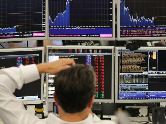 Stock markets around the world fell on fears that the new Covid strain could hamper economic recovery. Picture: Daniel Leal-Olivas/AFP/Getty Images