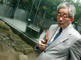 Nobel Prize for literature winner Kenzaburō Ōe visits the Nanjing Massacre Memorial museum in Jiangsu province, China in 2006 (Picture: China Photos/Getty Images)