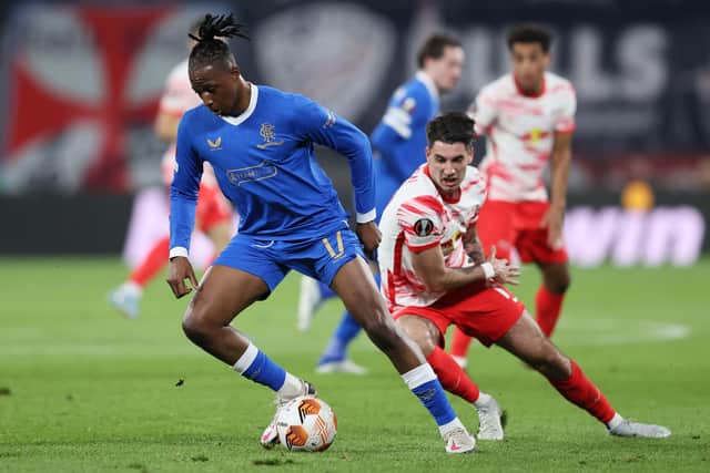 LEIPZIG, GERMANY - APRIL 28: Joe Aribo of Rangers is challenged by Dominik Szoboszlai of RB Leipzig during the UEFA Europa League Semi Final Leg One match between RB Leipzig and Rangers at Football Arena Leipzig on April 28, 2022 in Leipzig, Germany. (Photo by Martin Rose/Getty Images)