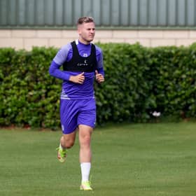 Hibs striker James Scott told to up his fitness levels if he wants to force his way back into contention. Photo by Craig Williamson / SNS Group
