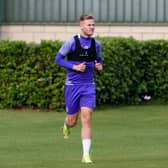 Hibs striker James Scott told to up his fitness levels if he wants to force his way back into contention. Photo by Craig Williamson / SNS Group