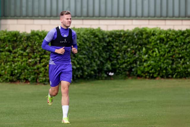 Hibs striker James Scott told to up his fitness levels if he wants to force his way back into contention. Photo by Craig Williamson / SNS Group