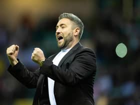 Hibs manager Lee Johnson celebrates the 4-2 win over Celtic.