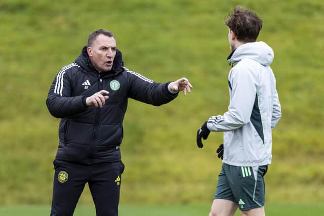 Brendan Rodgers gives Odin Thiago Holm instructions during a training session ahead of facing Motherwell.
