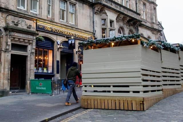 Cafes, bars and restaurants will be able to put tables and chairs on the pavement outside their premises without first obtaining planning permission, under changes expected to come in next month.