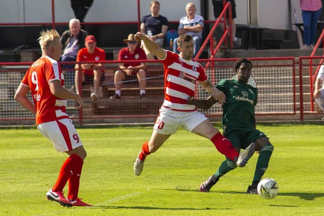 Celtic's Bosun Lawal scores  to make it 2-1 during the Lowland League match between Bonnyrigg Rose and Celtic B last season.