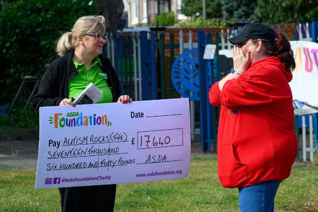 The Asda Foundation donates £17,640 to Autism Rocks (Fife). Pictured L – R Jean Ritchie, Asda Kirkcaldy Community Champion; Liza Quin, Founder, Autism Rocks (Fife)