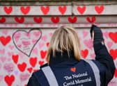 A memorial wall for those who have lost their lives to Covid.