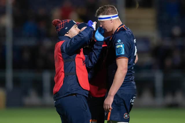 Edinburgh's Glen Young receives treatment for a head cut during the United Rugby Championship defeat by Lions.  (Photo by Mark Scates / SNS Group)