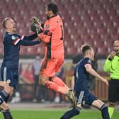 Scotland's players celebrate after winning the Euro 2020 play-off qualification football match between Serbia and Scotland at the Red Star Stadium in Belgrade on November 12, 2020.  (Photo by ANDREJ ISAKOVIC/AFP via Getty Images)