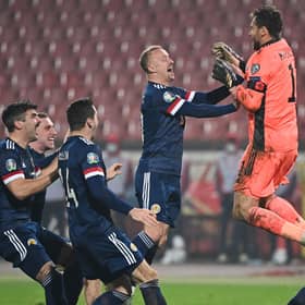 Scotland's players celebrate after winning the Euro 2020 play-off qualification football match between Serbia and Scotland at the Red Star Stadium in Belgrade on November 12, 2020.  (Photo by ANDREJ ISAKOVIC/AFP via Getty Images)