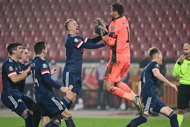 Scotland's players celebrate after winning the Euro 2020 play-off qualification football match between Serbia and Scotland at the Red Star Stadium in Belgrade on November 12, 2020. (Photo by ANDREJ ISAKOVIC/AFP via Getty Images)