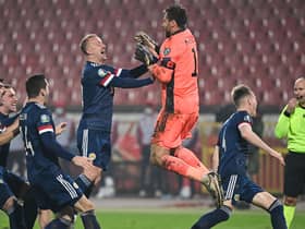 Scotland's players celebrate after winning the Euro 2020 play-off qualification football match between Serbia and Scotland at the Red Star Stadium in Belgrade on November 12, 2020.  (Photo by ANDREJ ISAKOVIC/AFP via Getty Images)
