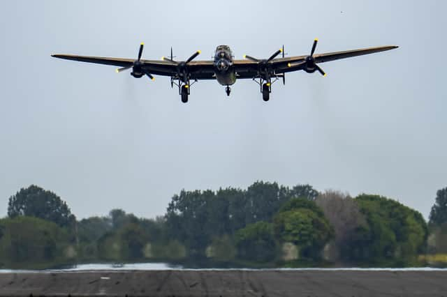 The City of Lincoln Lancaster Bomber takes to the sky for the memorial flight of the 80th anniversary of the WWII Dambusters Raid at RAF Coningsby