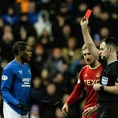 Referee Don Robertson shows Rangers' Dujon Sterling a red card for a tackle on Aberdeen's Jack MacKenzie. (Photo by Craig Williamson / SNS Group)