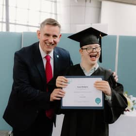 CEO of Capability Scotland Brian Logan celebrates with student Fergus McAlpine on his graduation from Corseford College.