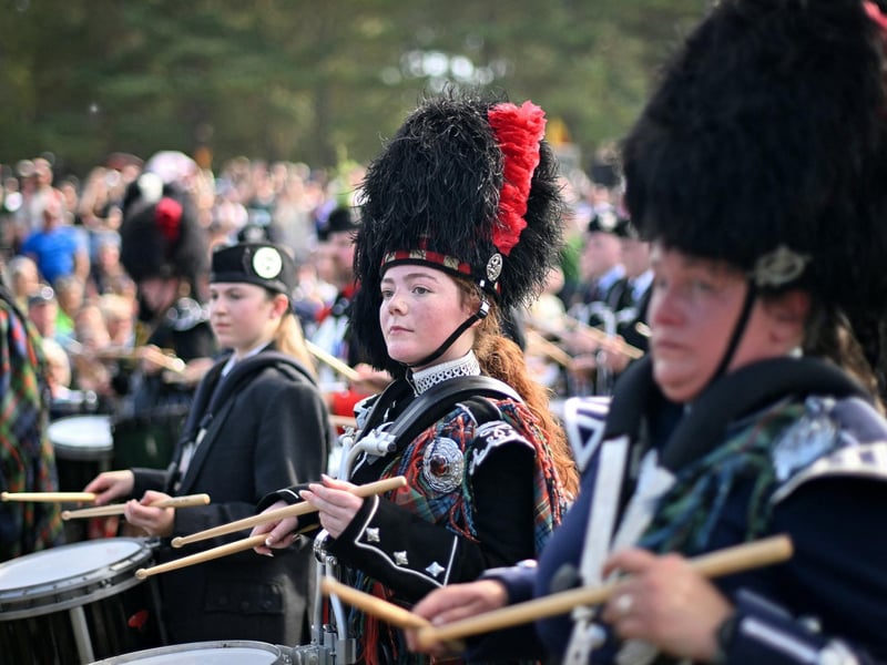 A member of a music band takes part in the annual Braemar Gathering