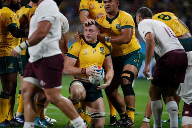 Jack Dempsey is congratulated after scoring a try for Australia against Georgia during the 2019 Rugby World Cup in Japan. It turned out to be his final match for the Wallabies. (Photo by Adrian Dennis/AFP via Getty Images)