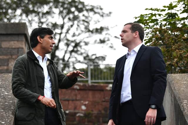 Rishi Sunak and Douglas Ross at Wemyss Bay train station. Picture: John Devlin