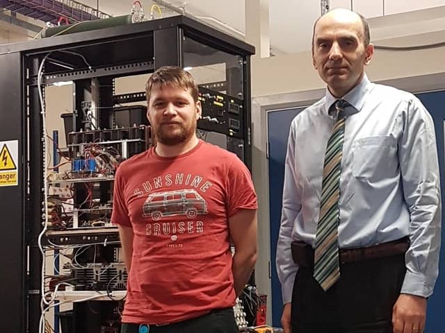 From left: technician Richard Osborne and Professor Dragan Jovcic from the School of Engineering at the University of Aberdeen beside the DC circuit-breaker. Picture: contributed.