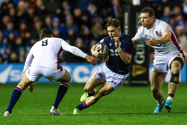 Scotland's Darcy Graham skips past the England defence during the Six Nations victory at BT Murrayfield.