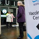 Members of the over 70s arrive at the EICC to receive their first dose of coronavirus vaccination on February 1, 2021.