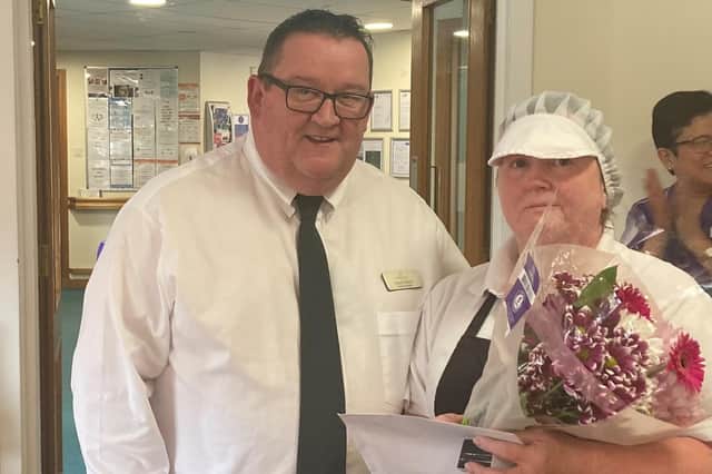 Sheila pictured with Kirkburn Court general manager David Garland.