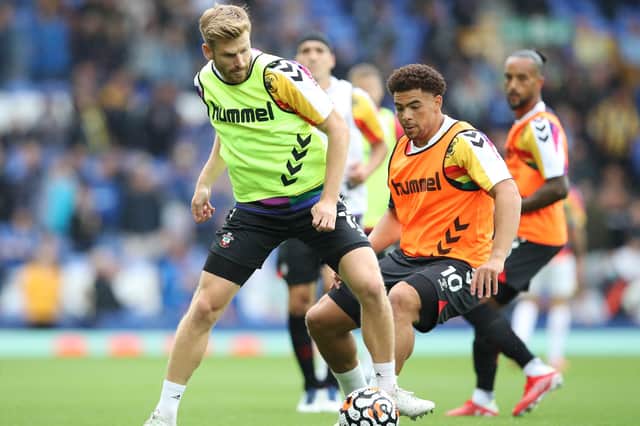 Stuart Armstrong warms up before the match against Everton at Goodison Park on August 14 - his last appearance for Southampton. (Photo by Ian MacNicol/Getty Images)