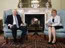 Boris Johnson and Nicola Sturgeon are political opponents with much in common (Picture: Duncan McGlynn/AFP via Getty Images)