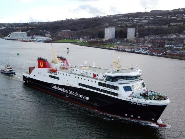 The Glen Sannox sails under its own power for the first time with a tug in tow. Picture: John Devlin