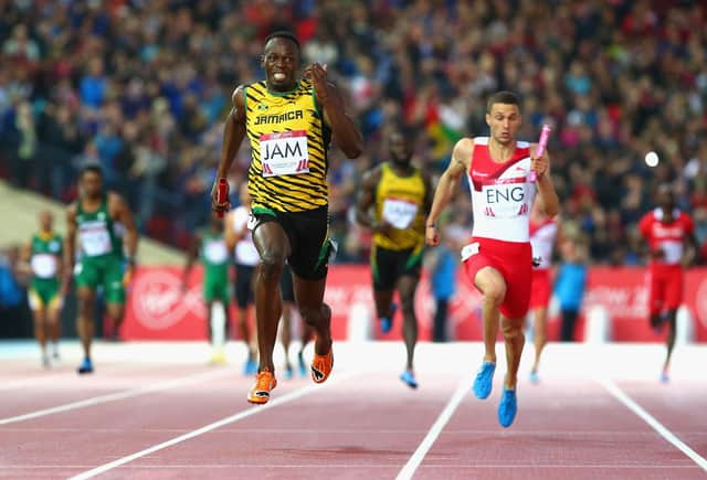 Usain Bolt of Jamaica crosses the line to win gold in the Men’s 4x100 metres relay final at Hampden Park at the Glasgow 2014 Commonwealth Games. AI will be central to the planning and delivery of the 2026 Games (Picture: Mark Kolbe/Getty Images)