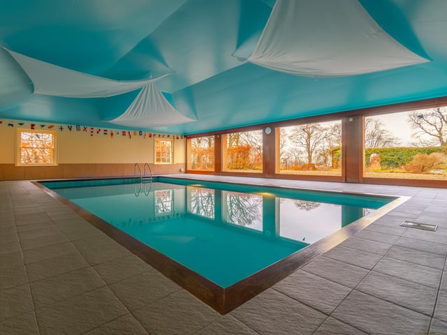Exterior: 6.64-acre of grounds include an all-weather fenced tennis court, a paddock and both a vegetable and herb garden, fringed by fruit trees.