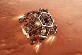 NASA's Perseverance rover firing up its descent stage engines as it nears the Martian surface. Picture: PA