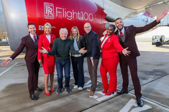 Virgin Atlantic founder Sir Richard Branson, centre, celebrates the first 100 per cent sustainable aviation fuel transatlantic flight. (Photo by Virgin Atlantic)