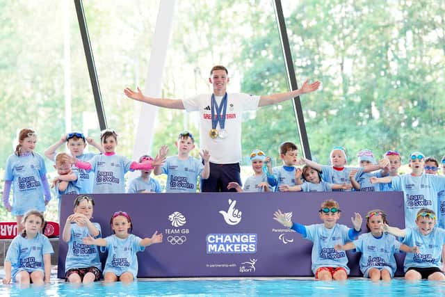 Duncan Scott give swimming tips to kids at the Peak Leisure Centre in Stirling. He is part of an athlete ChangeMaker initiative, a partnership between The National Lottery’s operator, Allwyn, Team GB, ParalympicsGB and UK Sport to support athletes who want to help social impact projects they are passionate about. Picture: Jane Barlow/PA Images