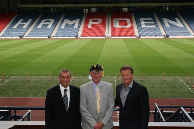 McGarr, centre, received a commemorative cap in a special ceremony at Hampden to mark two appearances he made for Scotland in 1969. Pictured with Scottish FA president Campbell Ogilvie, left, and performance director Mark Wotte. Picture from SFA.