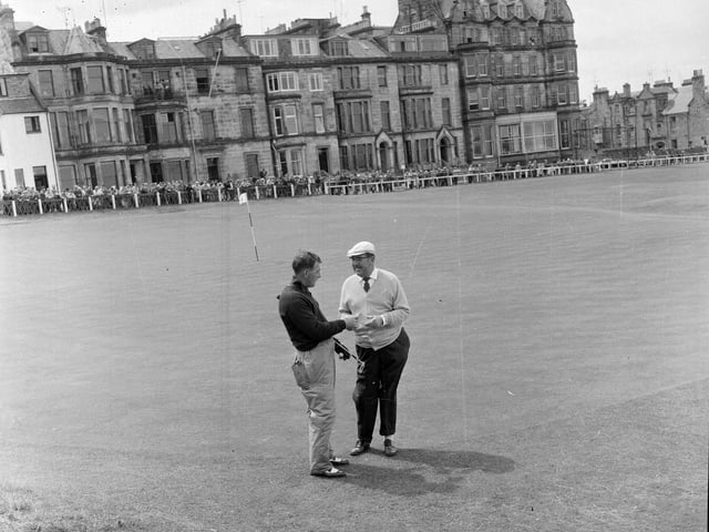 Four-time winner Bobby Locke congratulating playing partner Christy O'Conner on the 18th green during the 1964 Open Championship. O'Connor led after the first round but ended up tied for sixth.