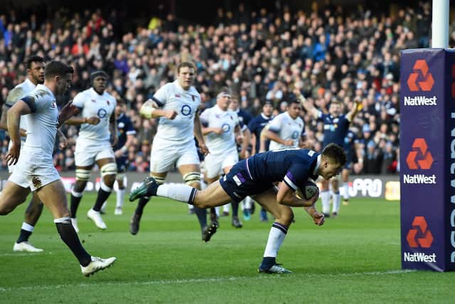Huw Jones scores the first of his two tries in the win over England at BT Murrayfield in 2018. Picture: Ian Rutherford/PA