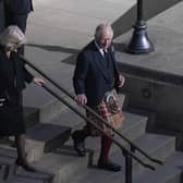 King Charles III arrives in Edinburgh with the Queen Consort as the Queen's coffin rested in the Scottish capital last week. PIC: Lisa Ferguson.