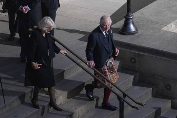 King Charles III arrives in Edinburgh with the Queen Consort as the Queen's coffin rested in the Scottish capital last week. PIC: Lisa Ferguson.