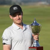 Jack South shows off the trophy after winning The Motocaddy Masters at Leven Links in 2021. Picture: PGA EuroPro Tour.