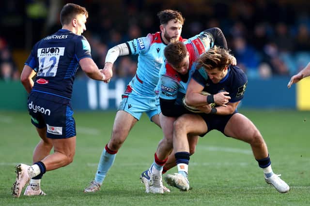 Glasgow's Huw Jones tackles Bath's Tom de Glanville during the Pool B - Challenge Cup match at The Recreation Ground on Saturday. (Photo by Clive Rose/Getty Images)