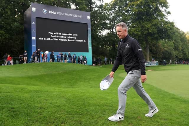 Luke Donald leaves the 18th green at Wentworth following the announcement of the death of Her Majesty Queen Elizabeth II during day one of the BMW PGA Championship. Picture: Warren Little/Getty Images.