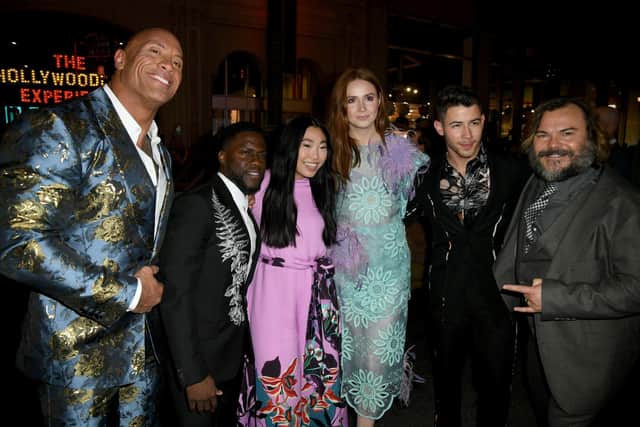 Karen Gillan with her Jumanji co-stars Dwayne Johnson, Kevin Hart, Awkwafina, Nick Jonas and Jack Black.