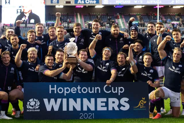 Scotland players lift the Hopetoun Cup following the 15-13 win over Australia. (Photo by Paul Devlin / SNS Group)