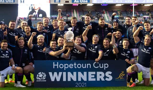Scotland players lift the Hopetoun Cup following the 15-13 win over Australia. (Photo by Paul Devlin / SNS Group)