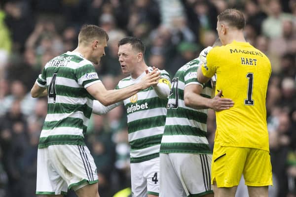 Callum McGregor celebrates Celtic's 1-0 win over Rangers with his team-mates.