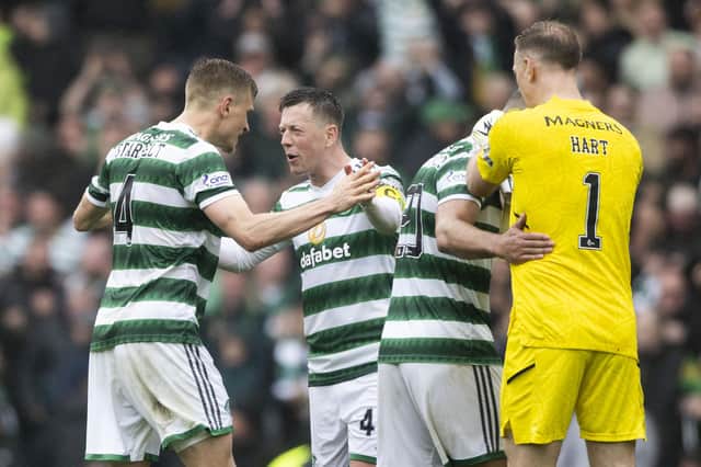 Callum McGregor celebrates Celtic's 1-0 win over Rangers with his team-mates.