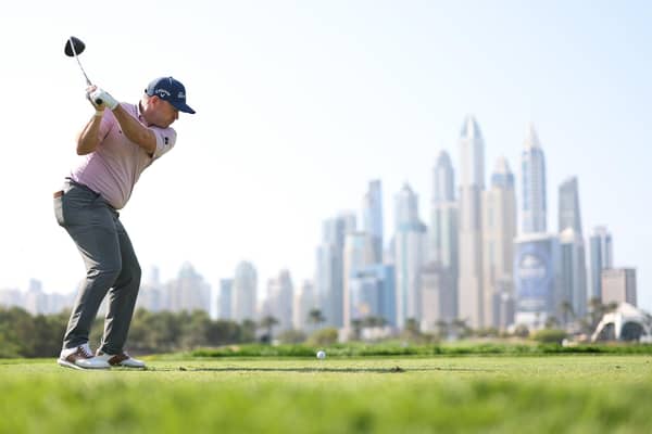 Richie Ramsay tees off on the eighth hole during round one of the Hero Dubai Desert Classic at Emirates Golf Club. Picture: Richard Heathcote/Getty Images.
